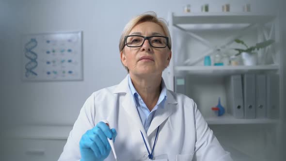 Patients Pov of Doctor Measuring Mouth Temperature With Electronic Thermometer