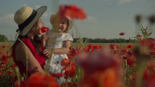 Mom and Daughter in a Poppy Field