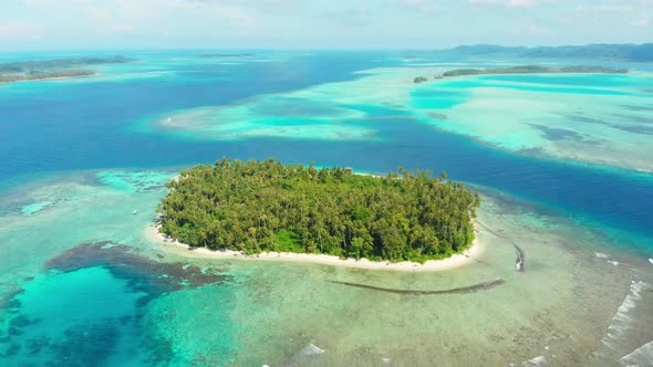 Aerial: flying over desert beach white beach tropical caribbean sea alt