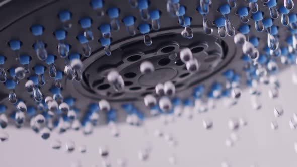 Drops of Clear Water Dripping From the Shower Head alt