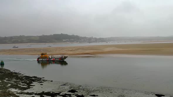 View of the sea from Padstow in Cornwall, England. It's a cloudy summer day with a lot of fogg. The alt