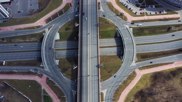 Aerial drone video of circular road junction in the city. alt