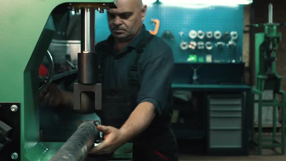 A Locksmith Repairing a Gimbal alt