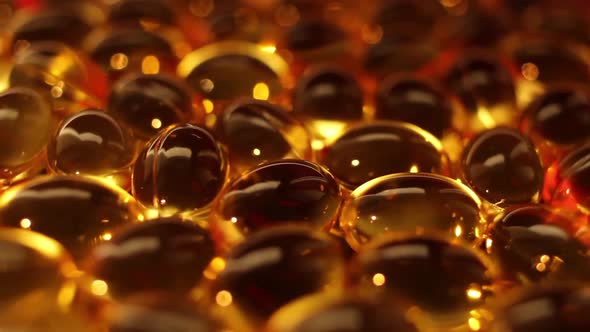 Brown transparent capsules of fish oil