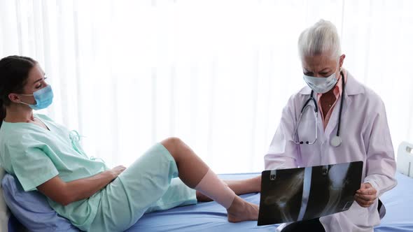Senior Female doctor explaining the woman patient's results from sick symptoms