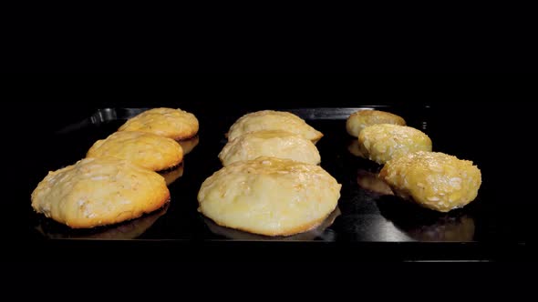Timelapse  Cooking Nine Oatmeal Cookies on Metal Sheet in Oven Cinemagraph