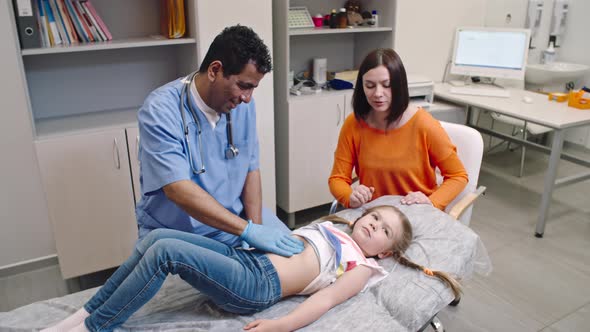 Little Girl At Abdominal Examination By Pressmaster Videohive