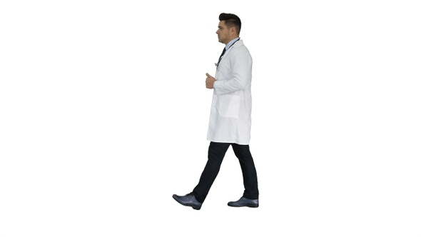 Walking male doctor passing by on white background alt