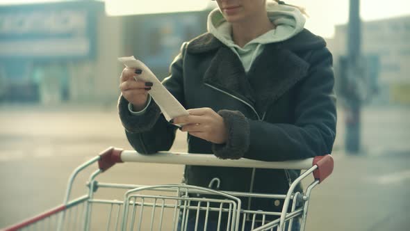 Cash Register Money Spending On Hypermarket. Home Finance Budget. Woman Check Bill Grocery Store. alt