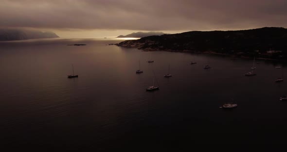 Aerial, Island Silhouettes On A Dark Morning And The Sea Bay In Sardinia Island On Sunrise