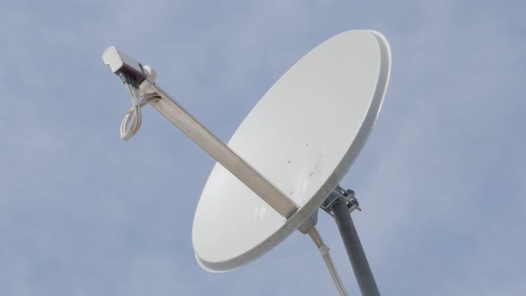 High gain parbolic type satellite dish antena against blue sky 4k 3840X2160 UltraHD footage - Satell alt