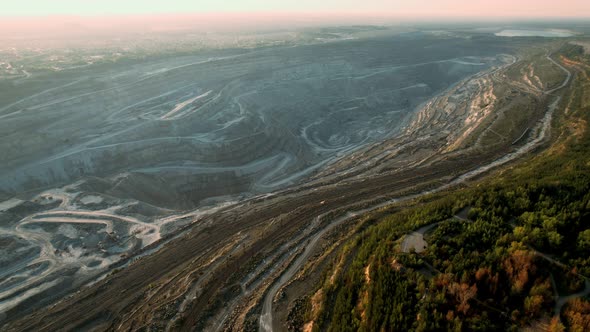 Asbestos Quarry a Dump Truck at Work in Open Pit alt