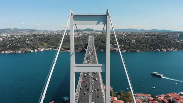 Aerial view of Fatih Sultan Mehmet Bridge and car traffic alt