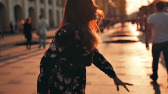 Happy Lady Crazy Dancing at Evening Sunset Street alt