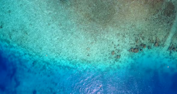Natural drone abstract view of a sunshine white sandy paradise beach and blue sea background in hi r alt
