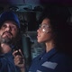 Mechanic team with man repair and woman hold clipboard diagnostics car in the garage. - VideoHive Item for Sale