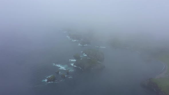 Flying Through a Clouds in Beautiful Unnamed Bay, Shikotan Island, Russia.