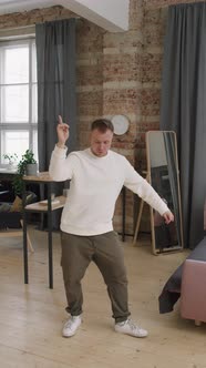 Guy Dancing at Home alt