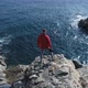 Adventurous Man Standing On The Edge Of The Cliff - VideoHive Item for Sale