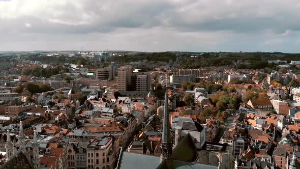 Aerial Tilt-down over Leuven Saint Peter's Church, Belgium alt