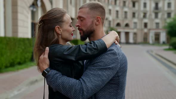 Lovers in Rain Man is Embracing and Kissing His Beloved Woman alt
