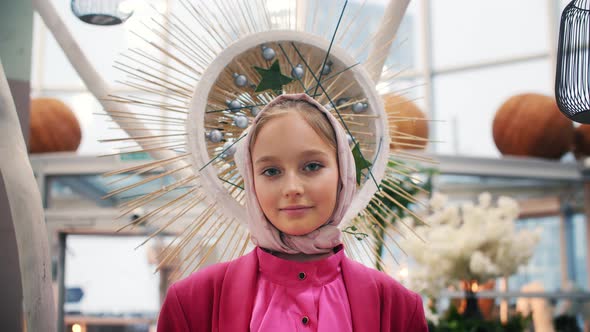 Portrait Young Arab Girl Looking To Camera on Decorative Background alt