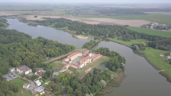 Aerial Shot on Sunny Day of Nesvizh Castle in Belarus. Top View of the Historic Castle, Which Is alt