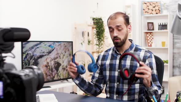 Famous Influencer Sharing His Opinion About Different Headphones alt