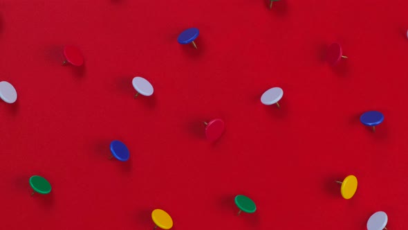 Rotating Red Background with Pushpins Ort Humbtack