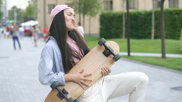 Happy asian woman having fun