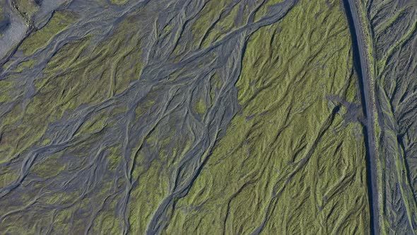 Drone Over Landscape With Dry Riverbed Of Braided River alt