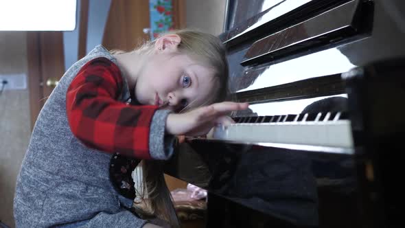Child Tired of Learning Piano