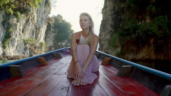 Model Riding on a Boat in Cheow Lan Lake alt