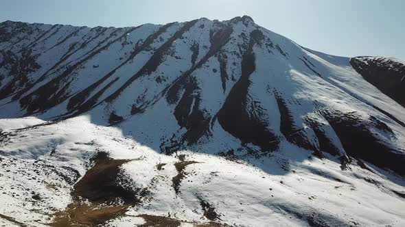 Autumn Mountains Covered with Snow in Places alt