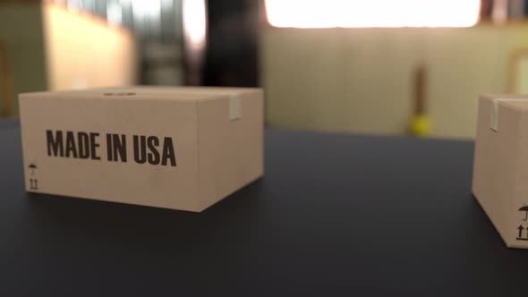 Boxes with MADE IN USA Text on Conveyor alt
