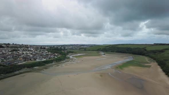 Populated Cornish Town Of Newquay United Kingdom By The Gannel River - aerial shot alt