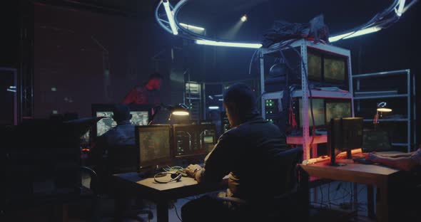 Soldier Pointing Gun at Comrades During Rocket Launch alt