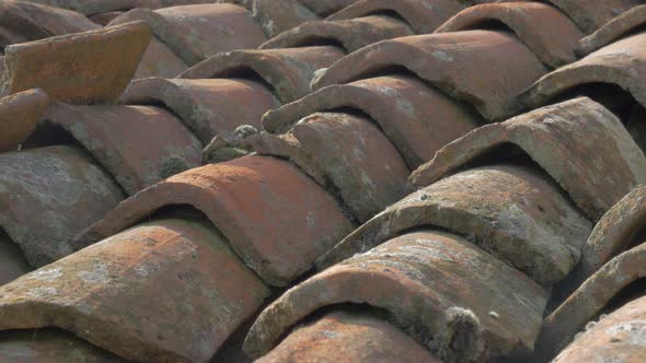 Ancient roof top pieces made of clay 4K 2160p UHD panning  footage - Roof top old tiles made in old  alt