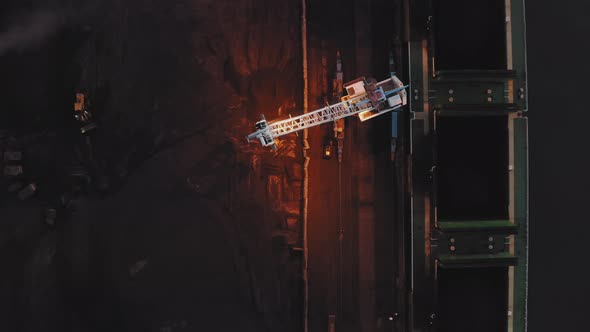 View From the Drone Vertically Down to the Loading of Coal on the Ship alt