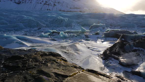 Iceland Giant Blue Glacier Ice Chunks With The Sun Peaking