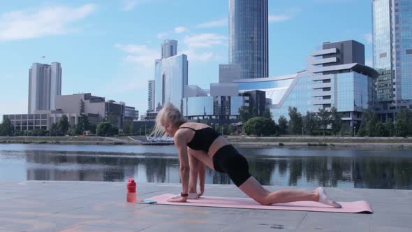 Woman working out in city