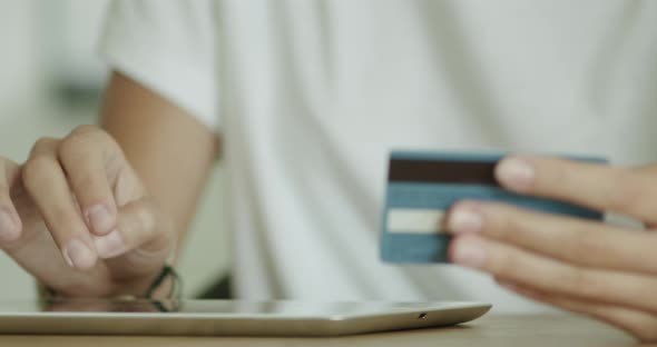 Woman Shopping With Credit Card Closeup