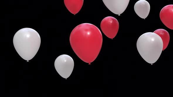 Red and white balloon floating