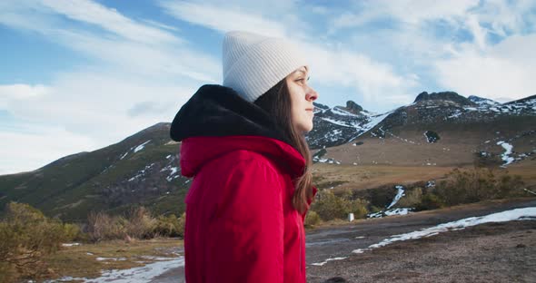 Portrait of Young Adult Woman Climbing Up the Mountain alt