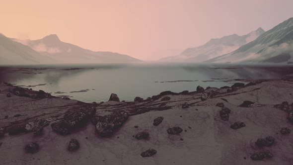 Sunset in the Gulf of the Arctic Ocean Cliffs Illuminated By Sunset alt