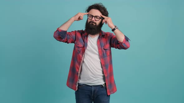 Exhausted Man, Suffering From a Headache Holding His Hands Behind Head alt
