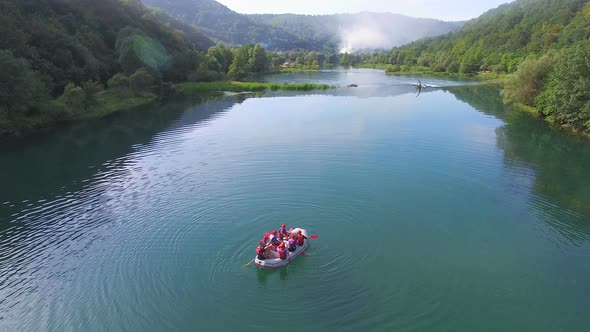 Rafters preparing to go down a waterfall of Una river in Bosnia alt
