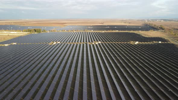 Aerial Top View of a Solar Panels Power Plant alt