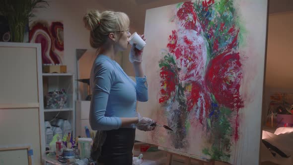 Talented Female Artist Working on a Modern Abstract Oil Painting Uses Splattering and Dripping 