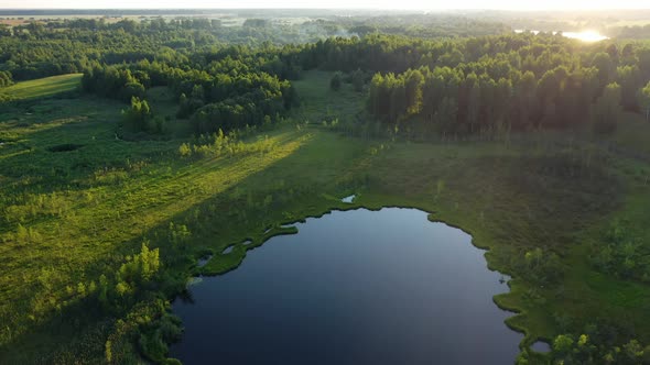 Aerial Panoramic View Of Nature With Lake, River And Green Forest At Summer Day